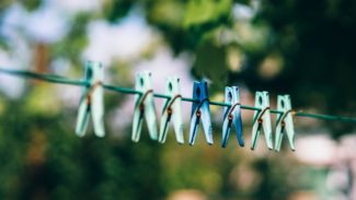 Pegs hanging on a washing line outside