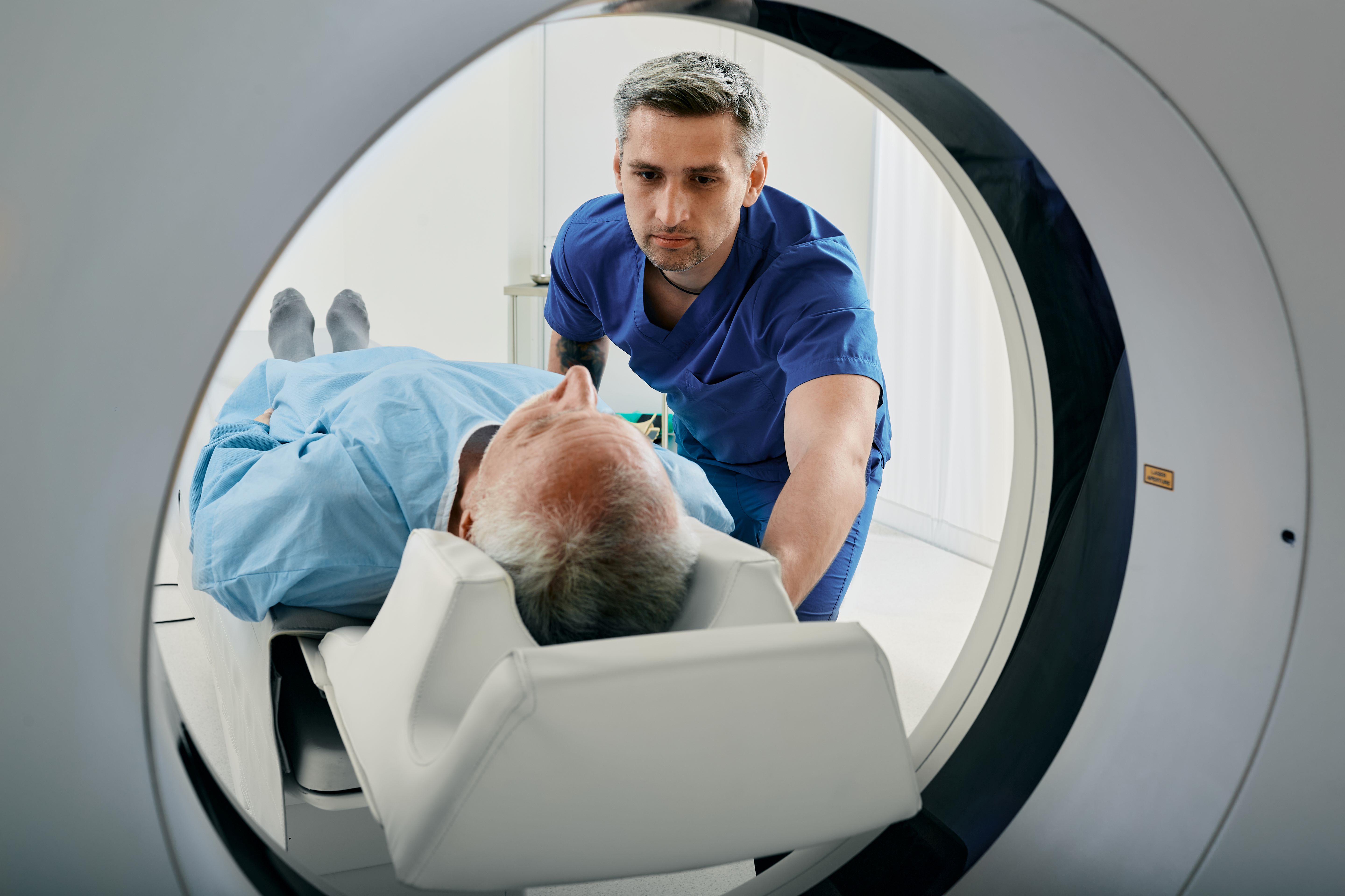 doctor and patient with MRI machine
